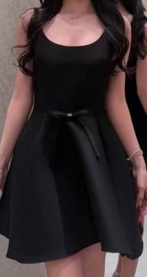 Fabric Concierge: By the picture, it has great volume for the skirt. and it's Dior, so it won't be polyester.  It also looks smooth and sleek.